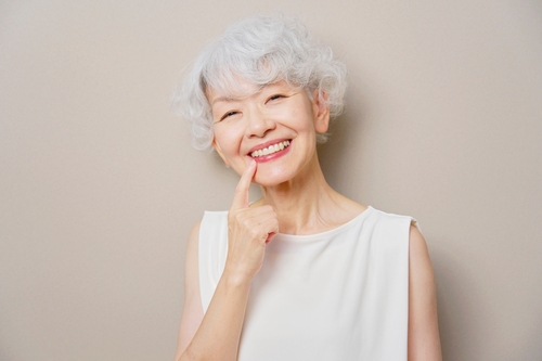 Smiling older woman with bright, natural-looking teeth